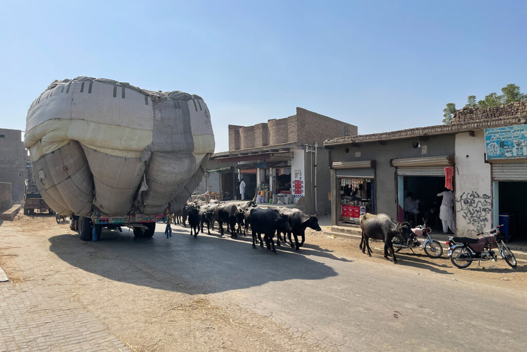 Overloaded cargo trucks are a popular sight in Pakistan