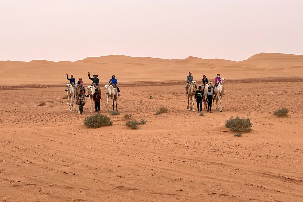 Camel ride in the Sahara, Algeria