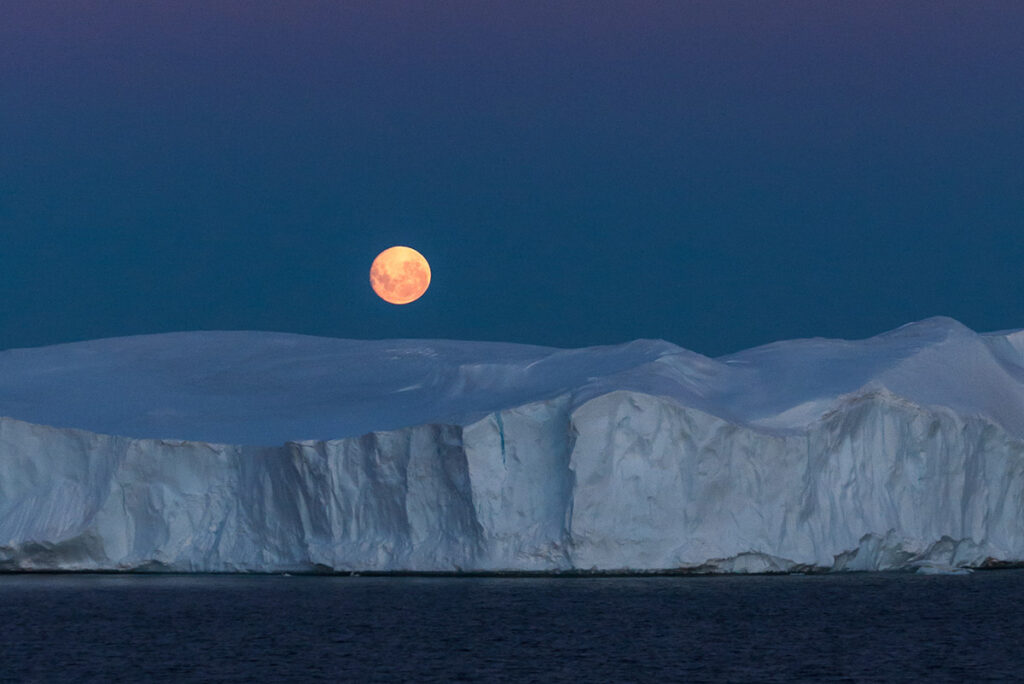 Moonrise over Antarctic ice