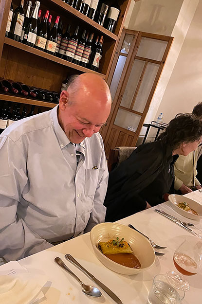 Don George stepping out of his comfort zone while travelling in Chiapas, Mexico and trying a tongue tamale. 